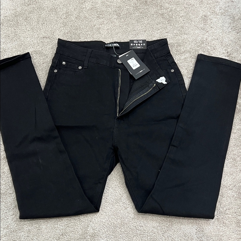 Brand new with tags black skinny jeans. Size 15.